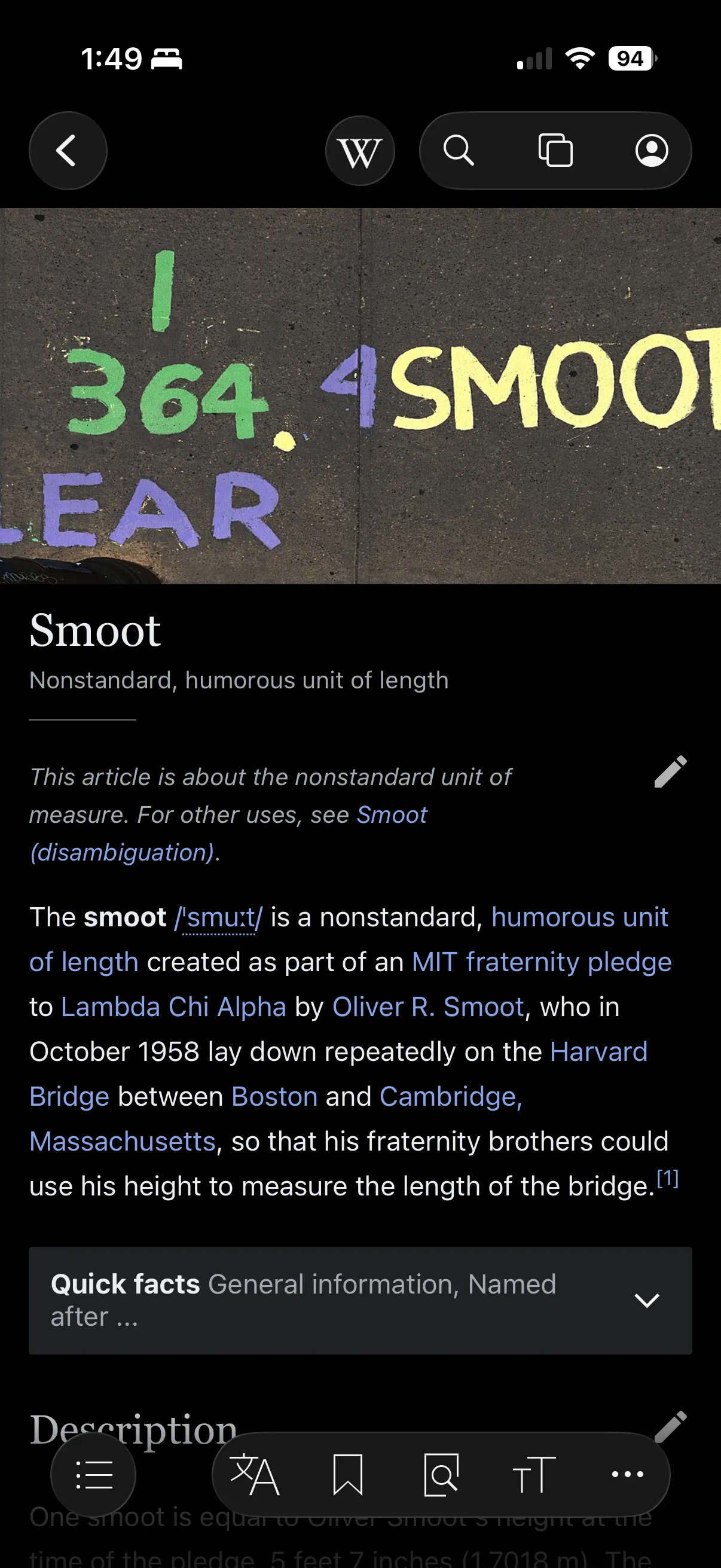 Phone screenshot of the Wikipedia article “Smoot”, a nonstandard humorous unit of length, headed by a photo of “364.4 SMOOTS” painted across the Harvard Bridge.